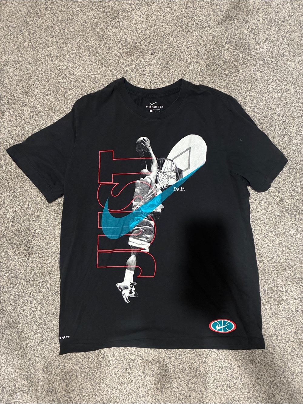 Nike Black Short-Sleeve Basketball Graphic Tee with Blue Swoosh and Red Accents